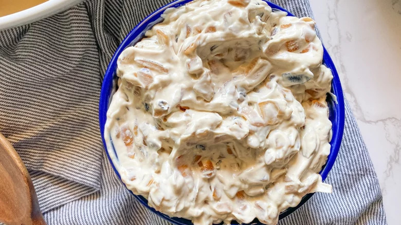 close up of bowl of caramelized onion dip