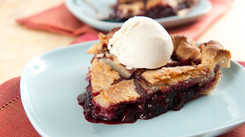 Marionberry pie on blue plate