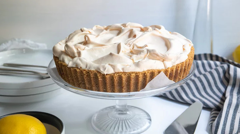 Meringue-topped lemon pie with graham cracker crust.