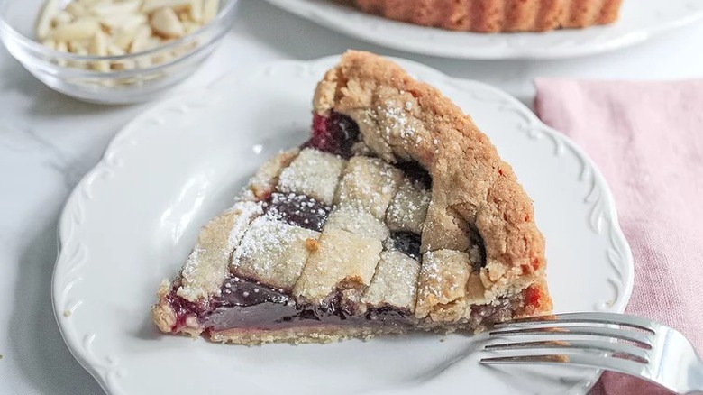 Lattice-topped torte with red raspberry filling.