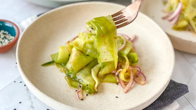 Sweet and sour cucumber salad in bowl