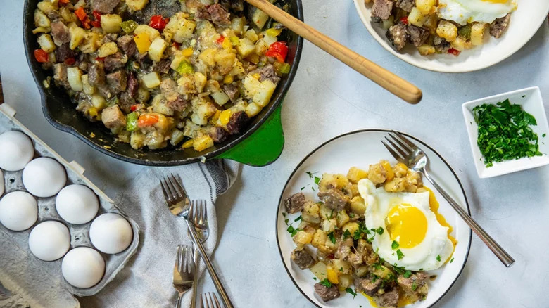 Potato and sausage skillet with fried eggs