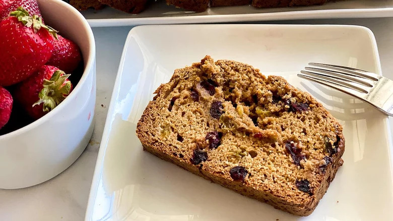 Slice of fruit bread and strawberries