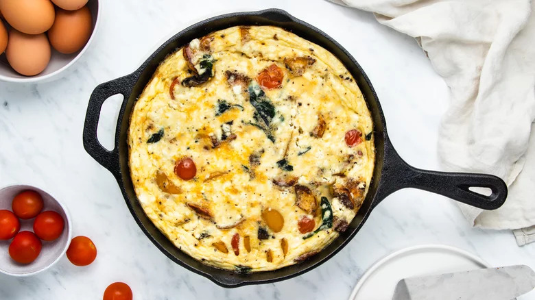 Skillet frittata with eggs and tomatoes