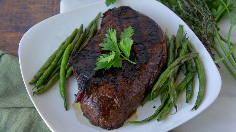 steak with parsley and beans