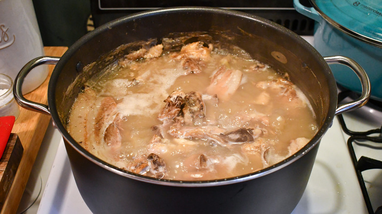 Boiling broth in large pot 