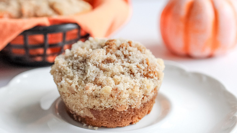 Pumpkin muffin on white plate