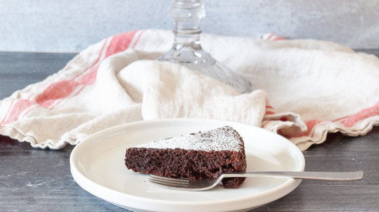 Chocolate cake on white plate