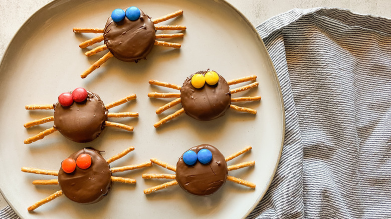 Spider-shaped cookies on plate