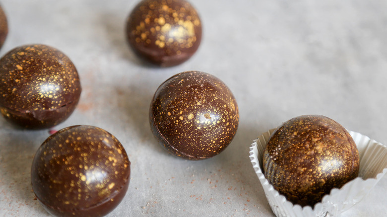 Gold-dusted hot chocolate bombs