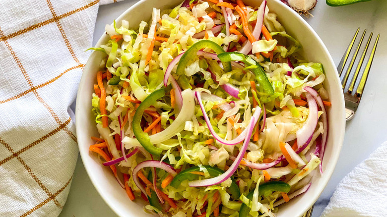 cabbage salad in white bowl