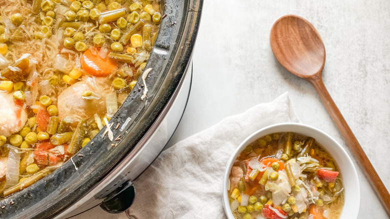 bowl and crockpot with stew