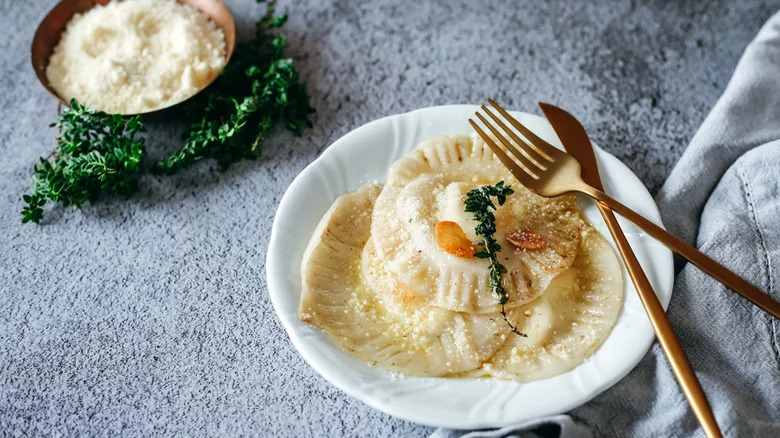 Wonton Ravioli with Parmesan cheese and cutlery