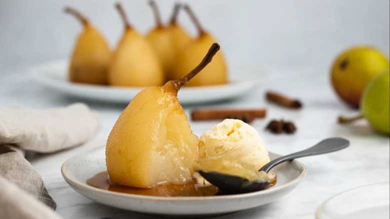 Poached Pears and ice cream and spoon