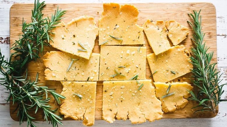 sliced rosemary flatbread on board