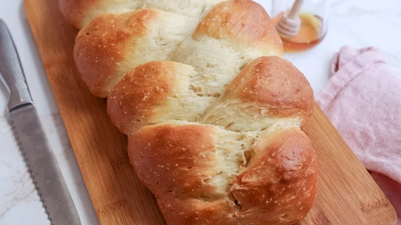 challah loaf on cutting board