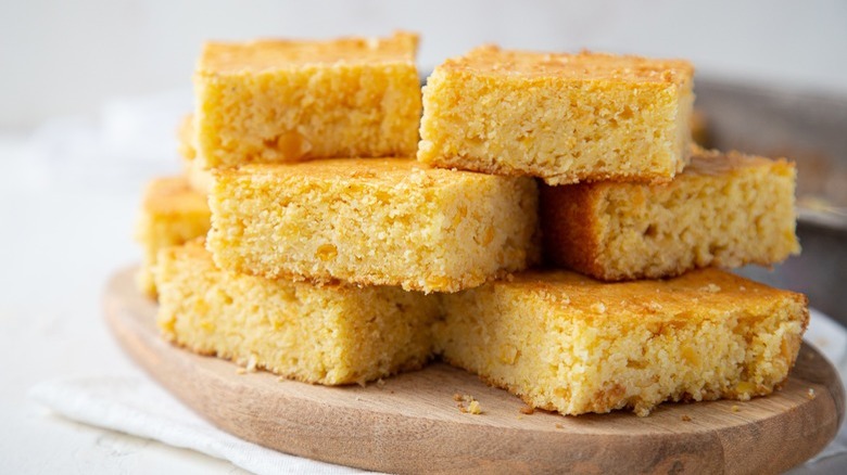 sliced cornbread on wooden board