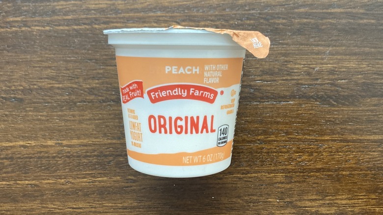 A container of Friendly Farms Yogurt is shown.