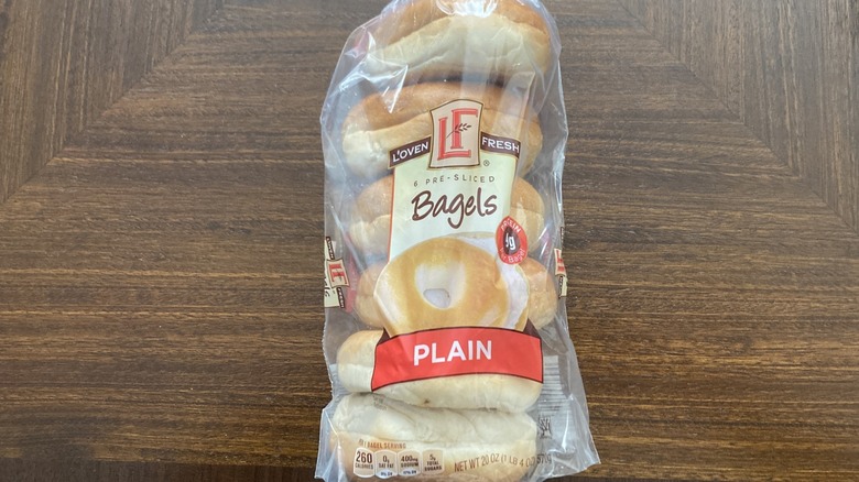 A bag of Loven Fresh Plain Bagels is shown.