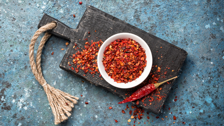 red pepper flakes in a white bowl