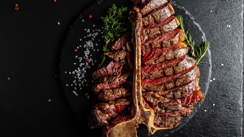 A sliced porterhouse steak