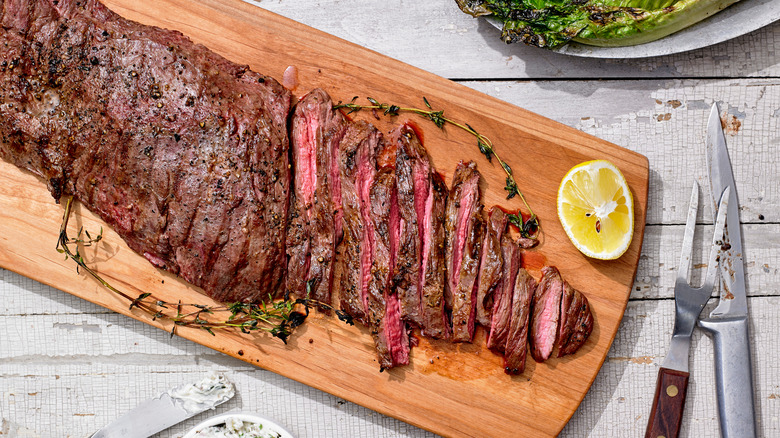 Grilled skirt steak on cutting board