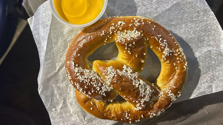 Soft pretzel with cheese sauce