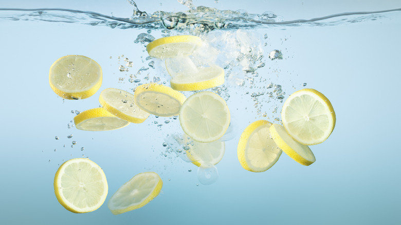 Lemon wedges in water