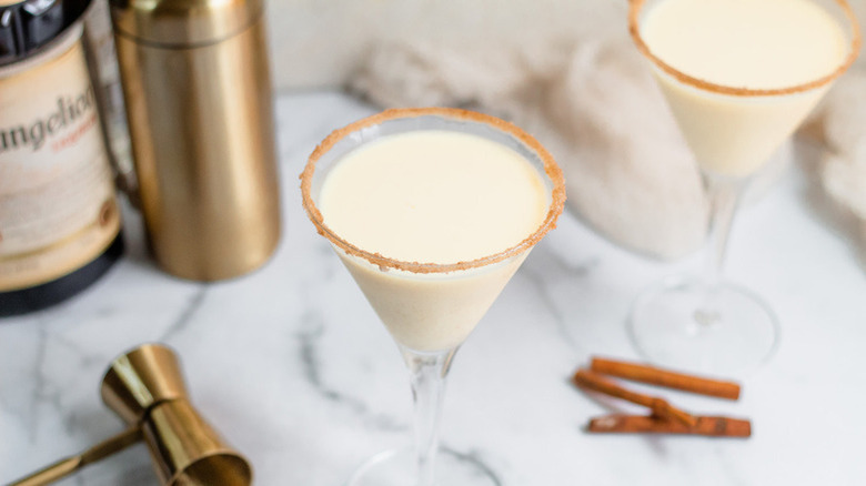 Eggnog martinis with cinnamon sticks