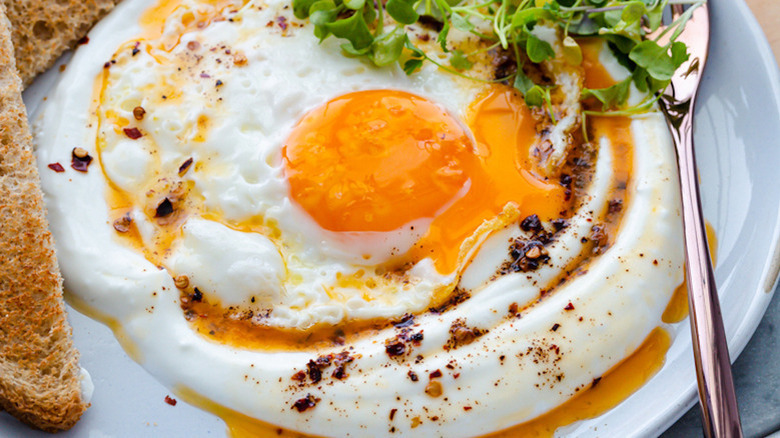 Fried egg on yogurt