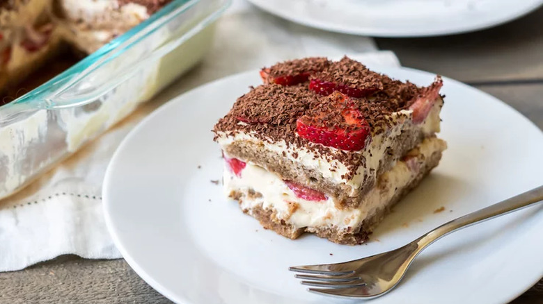 Chocolate and strawberry-topped tiramisu dessert.