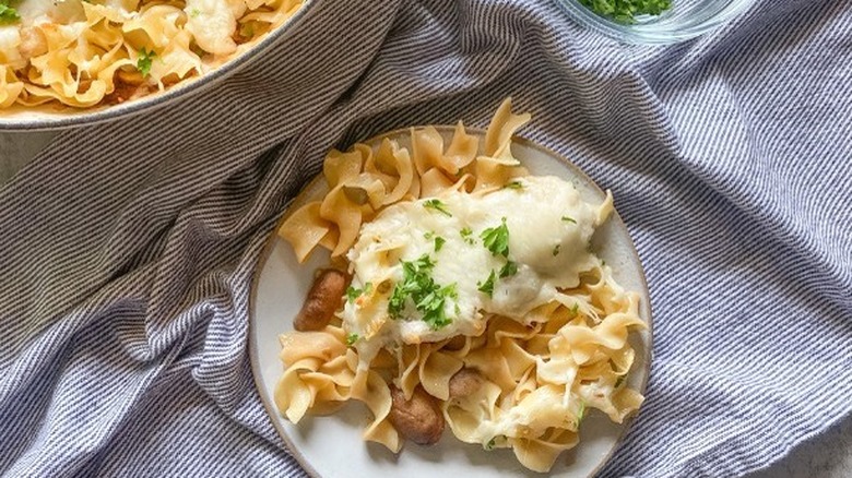 Egg noodles with chicken, mushrooms and cheese.