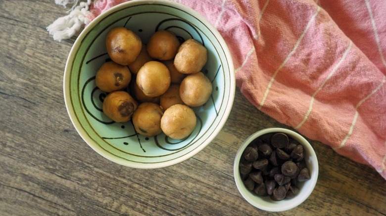 Bowl of cookie dough balls and chocolate chips