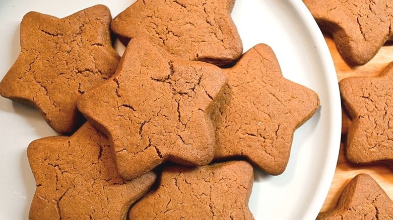 Star-shaped gingerbread cookies on plate