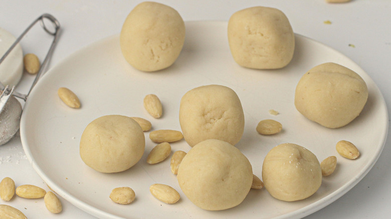 Marzipan balls and pale almonds