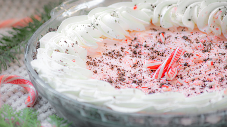 Glass dish with cream and peppermint pie filling