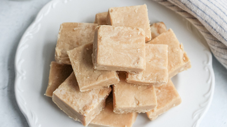 Plate with cubes of peanut butter fudge