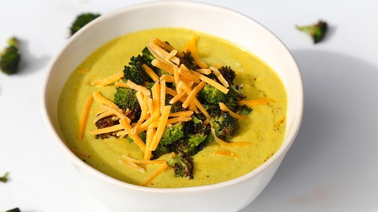 Cheese soup with broccoli in bowl