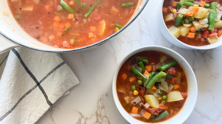 Bowls and pot of vegetable soup