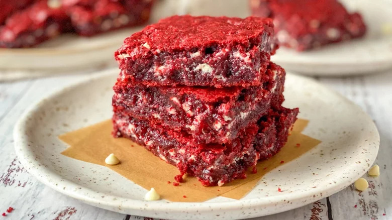 Red Velvet Brownies stacked on plate