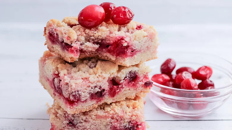 Stack of cranberry crumble bars 