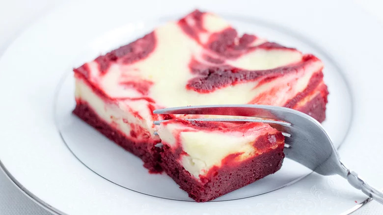 Red Velvet Cheesecake Brownie with fork