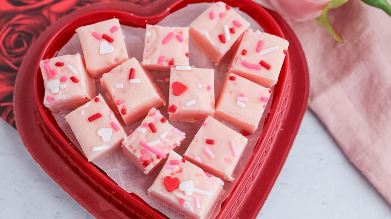 Pink valentine's day fudge in red heart-shaped box