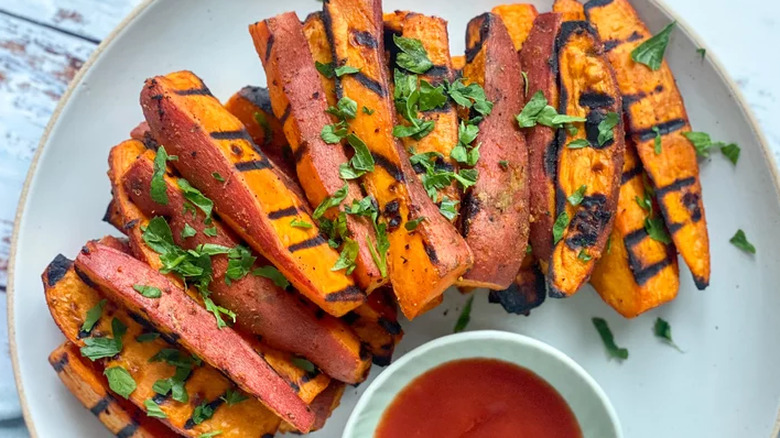 Sliced sweet potatoes with grill marks