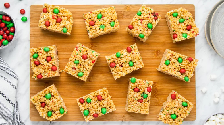 Rice krispie treats on a wooden board