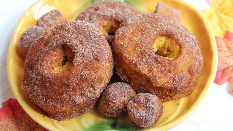 Plate with sugared donuts and donut holes