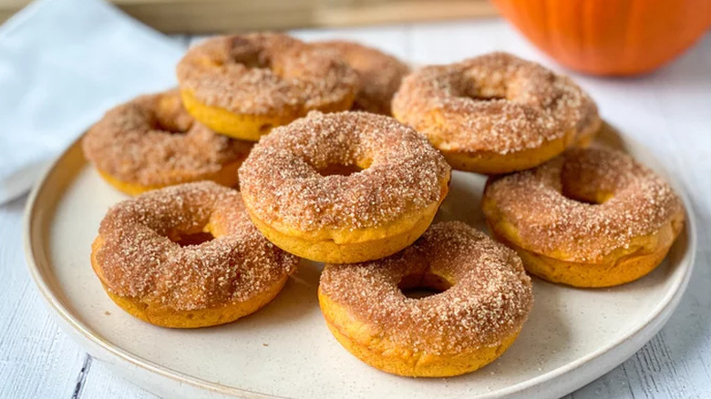 Plate of sugar-coated pumpkin donuts