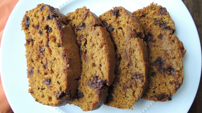 Slices of chocolate chip pumpkin bread on a plate