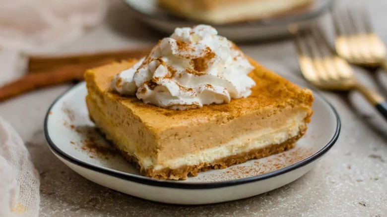 Two layer cheesecake bar on plate