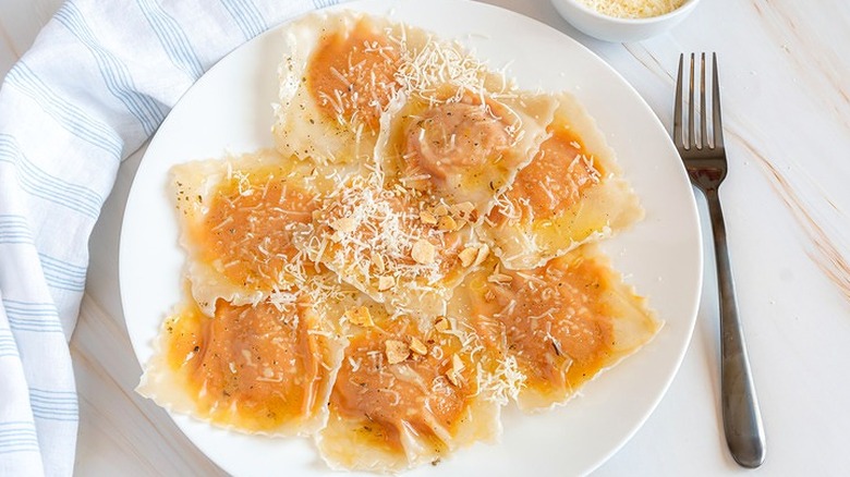 Plate with large pumpkin-filled ravioli